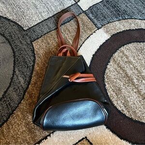 Women’s Greca Leather Purse/Backpack.